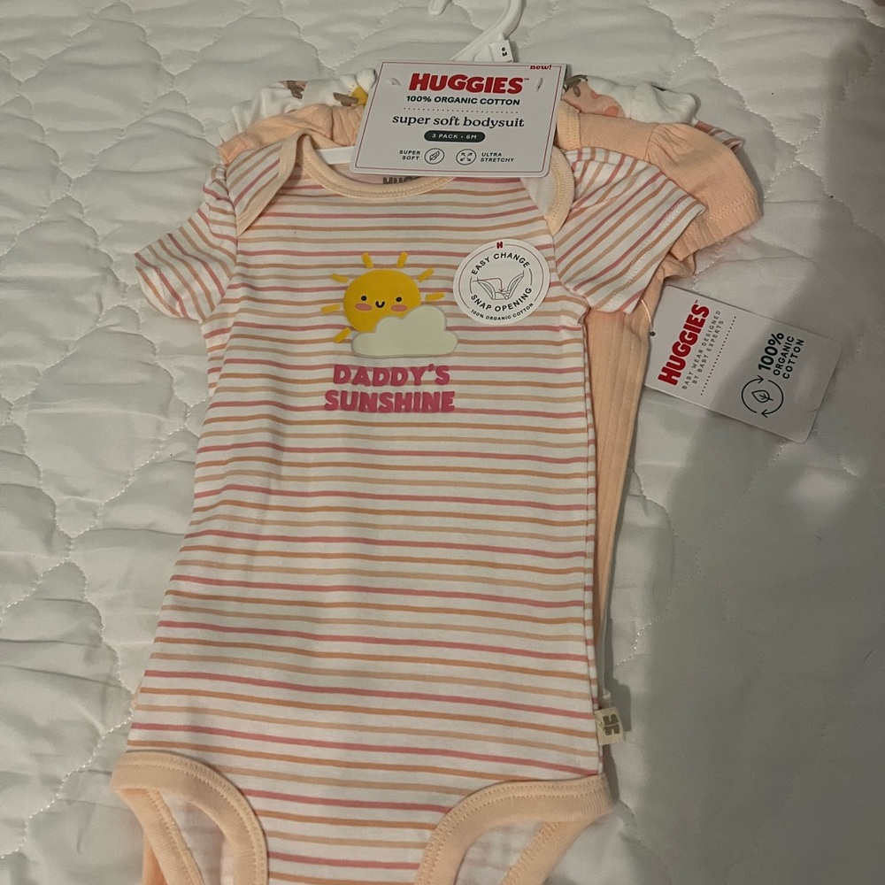 Pink and White Bodysuit with Snap Closure